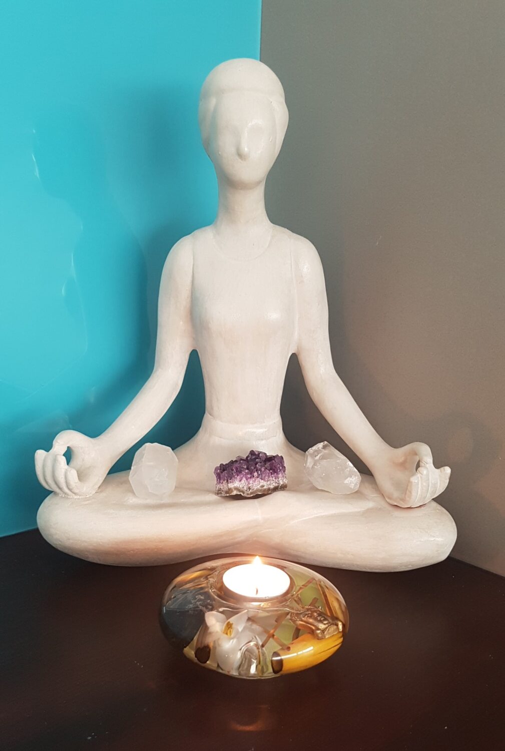 Meditation statue with candle